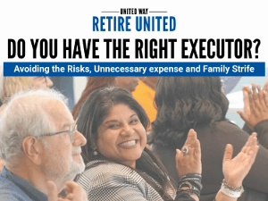 A person in a group looking in the camera and clapping.